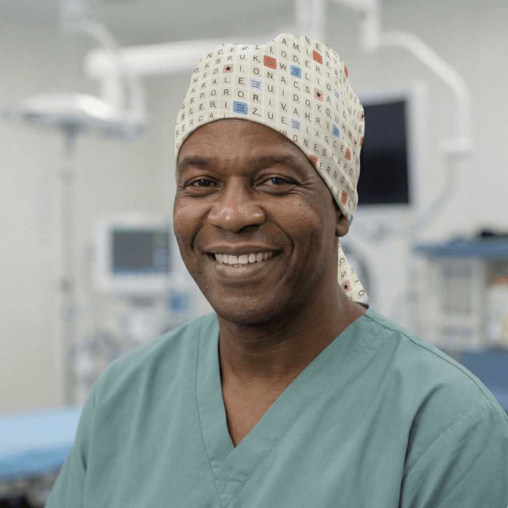 Side view of Scrabble pattern scrub cap on mannequin