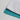 A Medicus Scrub Caps product—a Plain Satin Lined Scrub Cap in white and teal—sits folded on a light surface. The teal part displays partial black text reading ROLE, showcasing its eco-friendly design among 22 available colors.