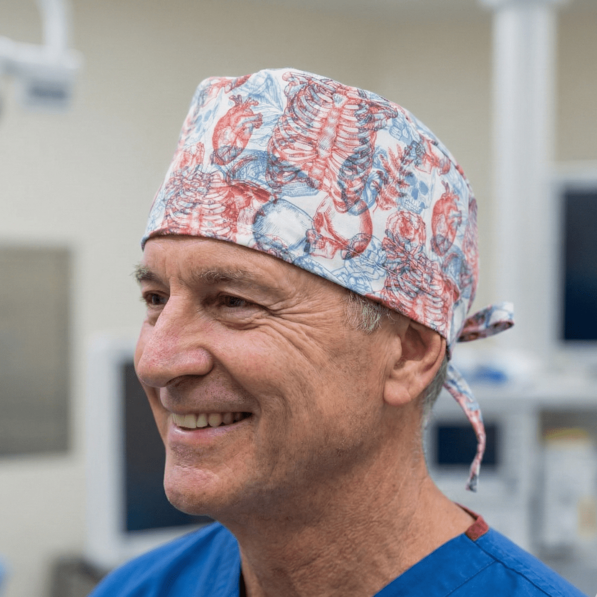 Red and blue anatomical skeleton pattern scrub cap with tie-back closure