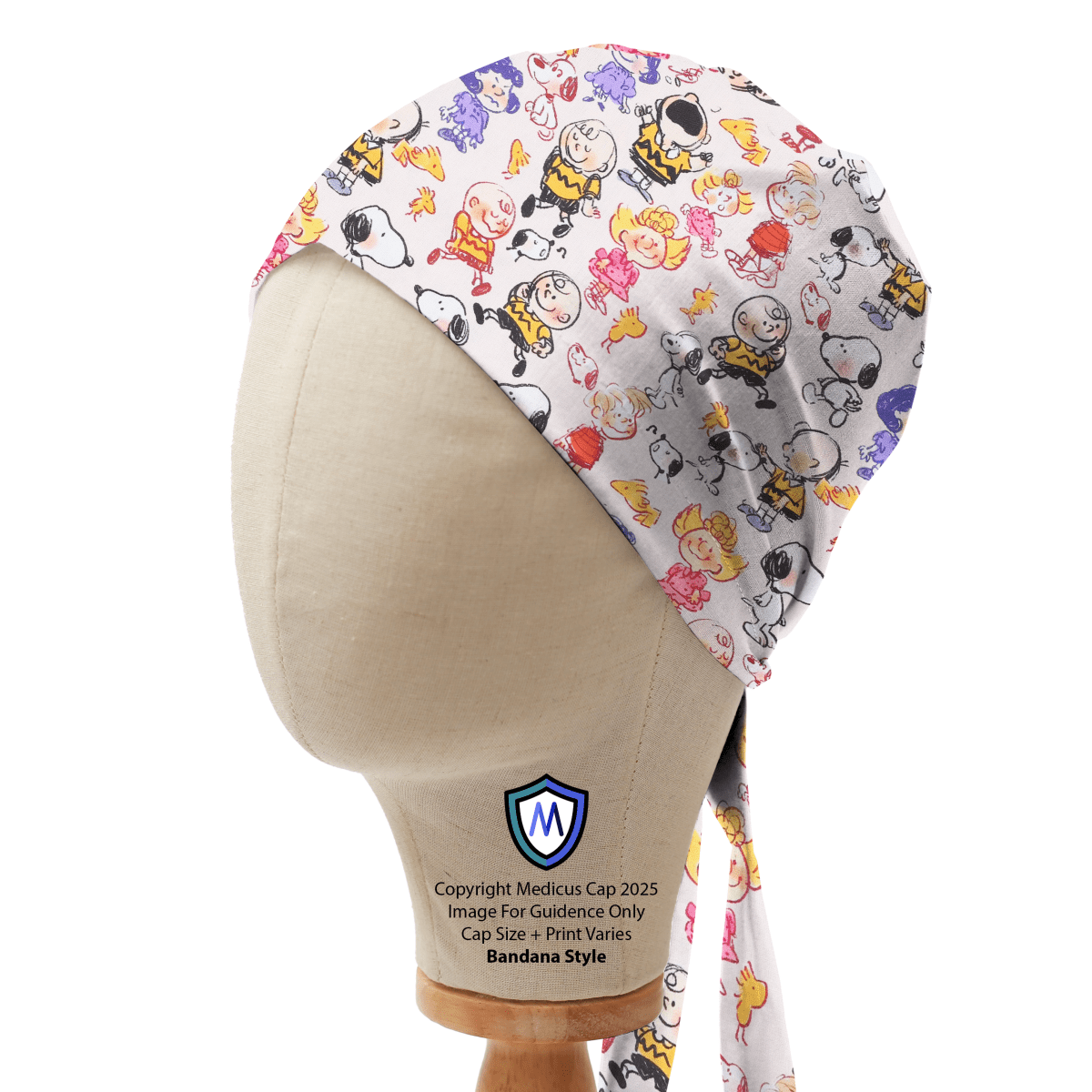 Bandana style scrub cap with Snoopy and Charlie Brown scribble-style cartoon print on white background, shown on mannequin side view.