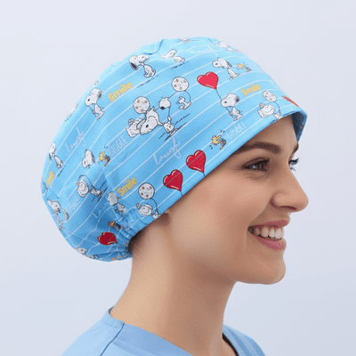 Light blue Snoopy cartoon scrub cap with red hearts and white characters pattern
