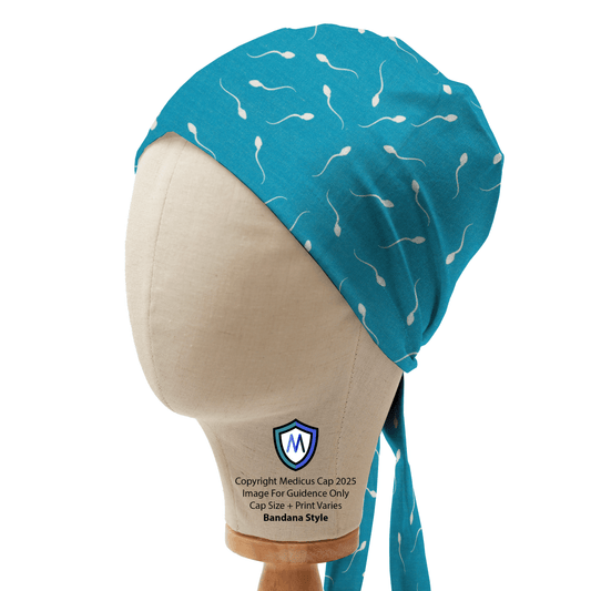 Blue Medicus scrub cap with a white sperm pattern, tied in a bandana style. Named "Sperm in Blue Lagoon Scrub Cap."