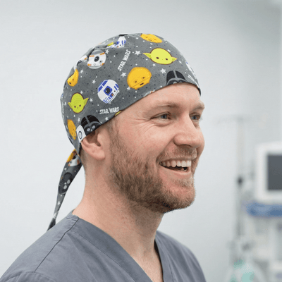Grey Star Wars kawaii print scrub cap with yellow Yoda and cute character heads