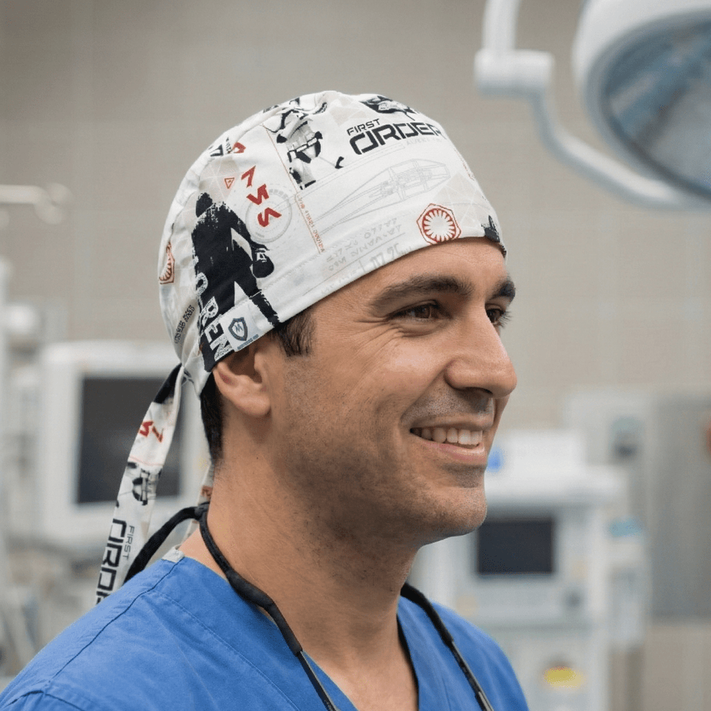 White Star Wars patterned scrub cap with black character silhouettes and red accents