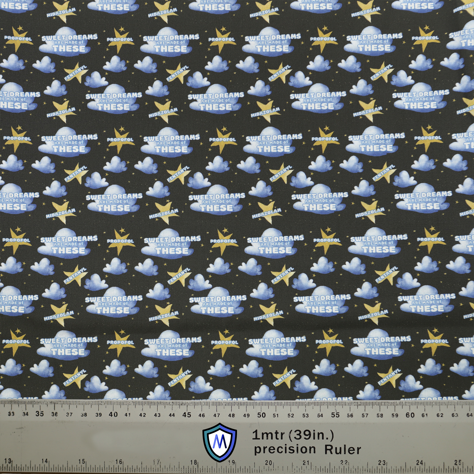 Anaesthetist Sweet Dreams Made Of These Scrub Cap from Medicus Scrub Caps, featuring clouds, stars, and anesthetic drug names on a dark background.