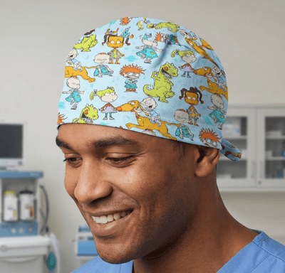Light blue Rugrats cartoon character print scrub cap with colourful babies pattern