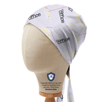 Side view of The Office Paper Falling scrub cap with white background and scattered office text pattern
