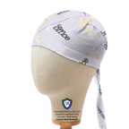 The Office Paper Falling scrub cap side view showing white pattern with yellow accents and tie detail