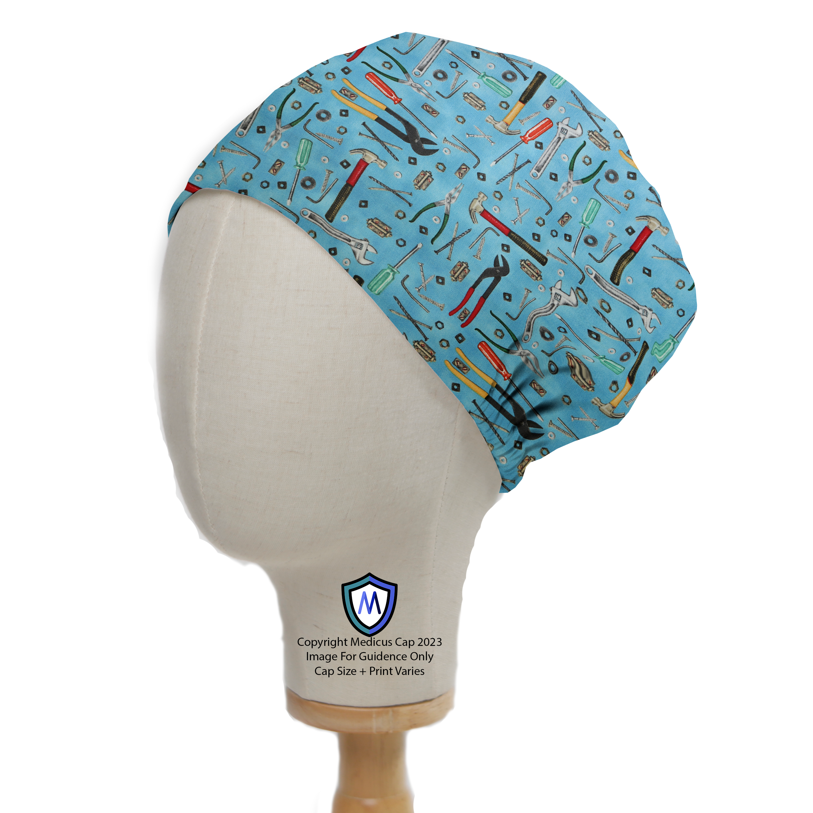 Tools Wrench Hammer On Lighter Blue Scrub Cap from Medicus Scrub Caps, featuring a pattern of various hand tools on a light blue background.