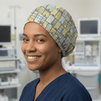 Townhouse scrub cap with colorful building pattern shown in side profile view on healthcare worker