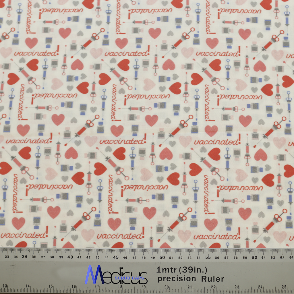 Covid Vaccine Love Scrub Cap from Medicus Scrub Caps, featuring a pattern of syringes, hearts, and "vaccinated" text on a white background.