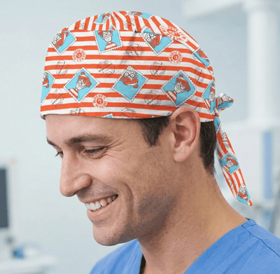 Orange and white striped scrub cap with Where's Wally character pattern and tie-back design