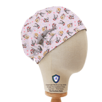 Side view of Winnie The Pooh Christmas Lights scrub cap showing pink fabric with cartoon characters pattern