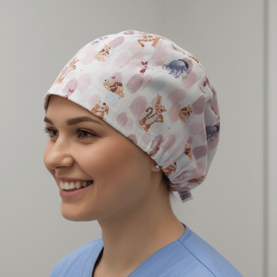Winnie the Pooh pastel pink scrub cap with cartoon characters and watercolour design