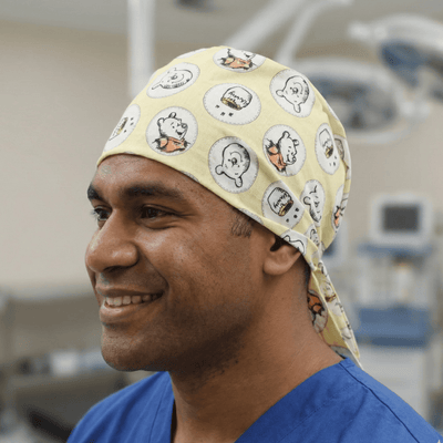 Winnie the Pooh Honey Pots scrub cap shown on model