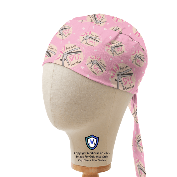 Pink Medicus Scrub Cap with "You are SPECtacular" design, displayed on a mannequin head. Ideal for medical professionals.
