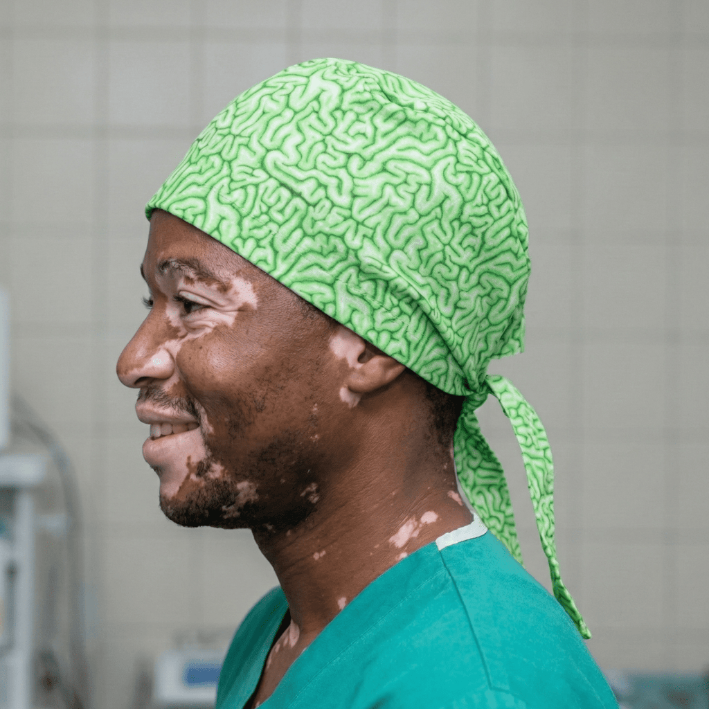 Bright green zombie brain pattern surgical scrub cap with tie-back closure