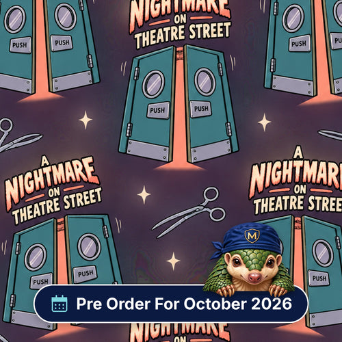 A Nightmare On Theatre Street scrub cap print: glowing theatre double doors with scissors and spooky lettering on dark purple, with a Pre Order For October 2026 badge