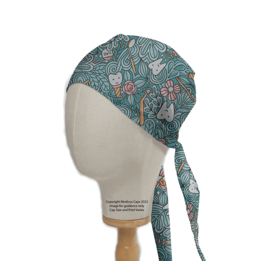 A Medicus Scrub Caps mannequin head displays the Abstract Jungle Tooth Teeth Scrub Cap, capturing dentistrys playful charm with cartoon teeth, toothbrushes, and dental tools on a teal background.