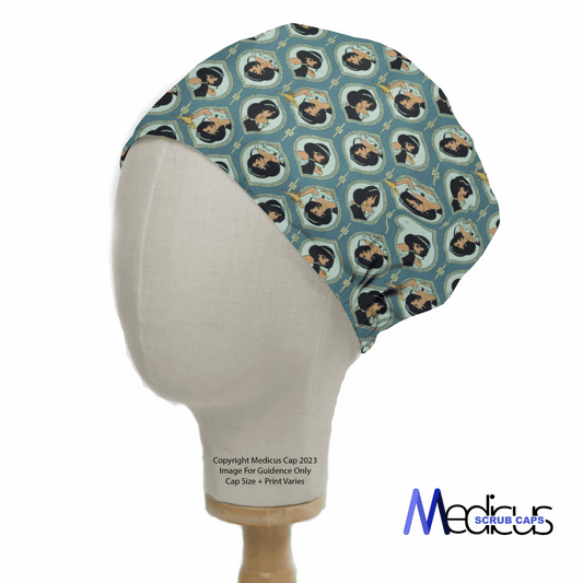 A side view of a mannequin head displays the Aladdin Jasmine Heads Theatre Cap by Medicus Scrub Caps, featuring a vintage pattern with small portraits on teal backgrounds and ornate frames. Ideal for healthcare professionals, the logo appears at the bottom right.