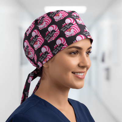 Alice In Wonderland Cat We Are All Mad scrub cap shown on female model