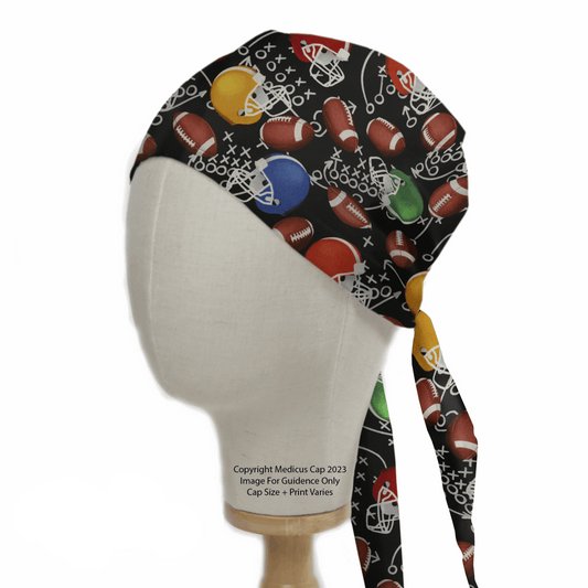 A mannequin head displays the American Football Theatre Cap by Medicus Scrub Caps, featuring vibrant football, helmet, and play prints. This eco-friendly cap is adjustable with straps, combining style and sustainability for sports enthusiasts.