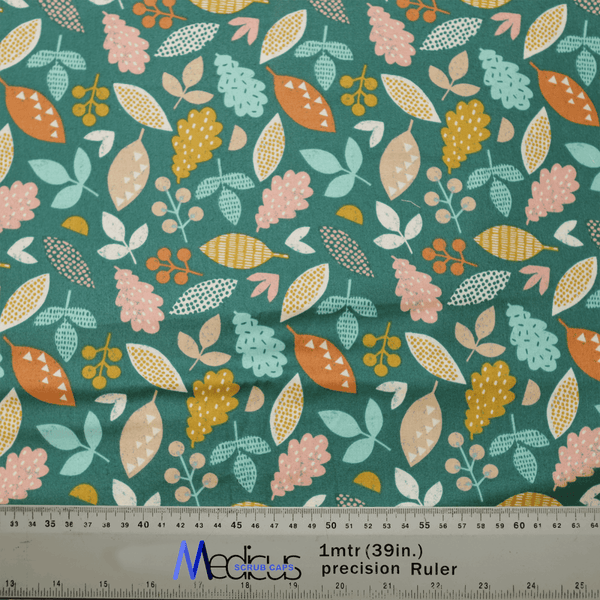 The Autumn Leaves #2 Theatre Cap by Medicus Scrub Caps is a sustainable fabric featuring a green backdrop with leaves and berries in pink, orange, and yellow. Its perfect for crafting stylish caps and includes a 1-meter (39-inch) ruler at the bottom.