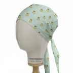 Bees On Teal scrub cap shown on mannequin head