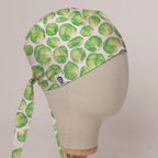 Brussels Sprouts scrub cap in Bandana tie-back style on mannequin head, front right view with the Medicus label