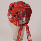 Cartoon Time Machine scrub cap in Bandana tie-back style on mannequin head, back view with ties