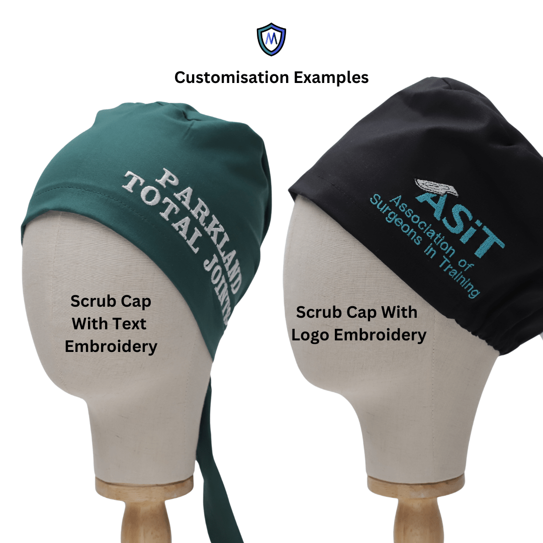 Two mannequin heads display scrub caps: green with text embroidery, black with logo embroidery.