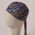 Colourful Peacock scrub cap in Bandana tie-back style: colourful peacock feathers on periwinkle blue
