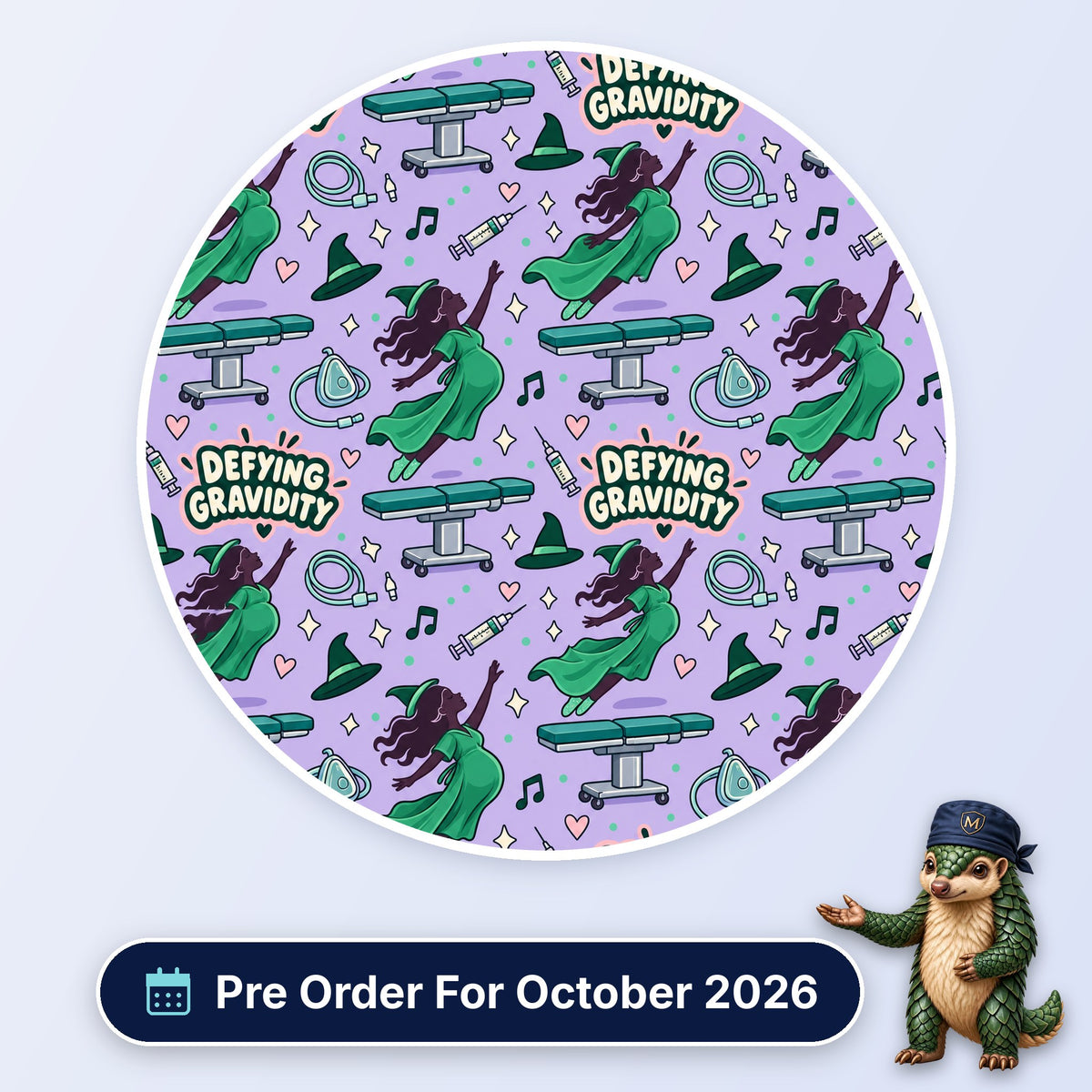 Defying Gravidity scrub cap print: a flying witch in green with operating tables, masks and syringes on lilac, with a Pre Order For October 2026 badge