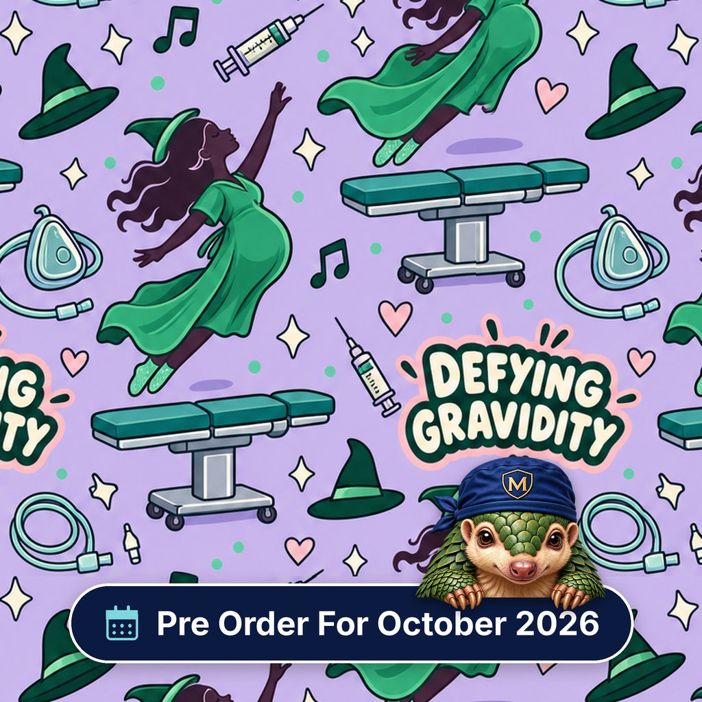 Defying Gravidity scrub cap print: a flying witch in green with operating tables, masks and syringes on lilac, with a Pre Order For October 2026 badge