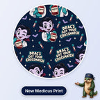 Drac's Got Your Crossmatch scrub cap print: cartoon vampire in a lab coat holding crossmatched blood bags with bats on navy