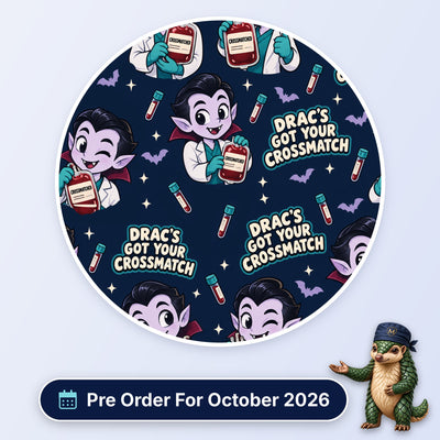Drac's Got Your Crossmatch scrub cap print: cartoon vampire in a lab coat holding crossmatched blood bags with bats on navy, with a Pre Order For October 2026 badge