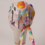 Electric Guitars Multicoloured scrub cap in Bandana tie-back style on mannequin head, back view with ties