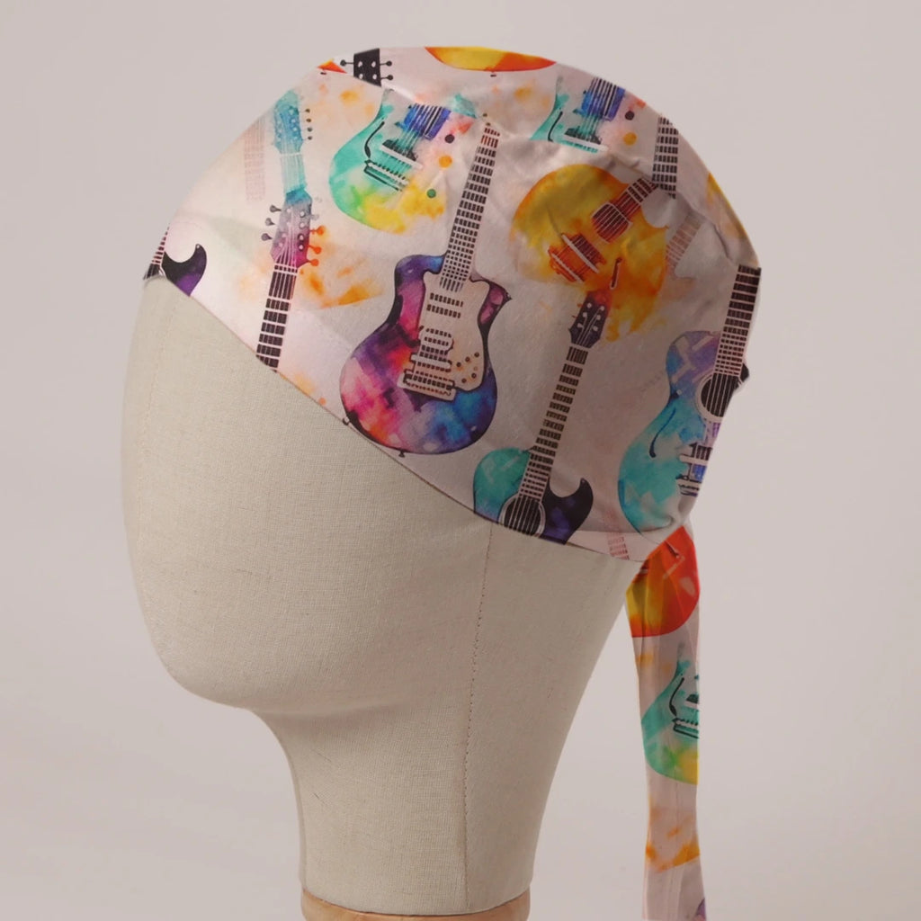 Electric Guitars Multicoloured scrub cap in Bandana tie-back style: watercolour electric guitars in rainbow colours on white