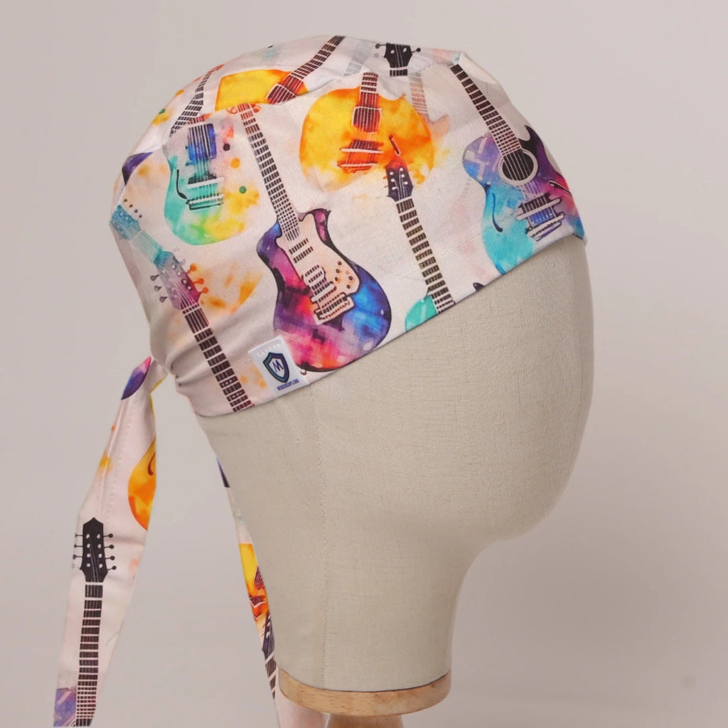 Electric Guitars Multicoloured scrub cap in Bandana tie-back style on mannequin head, front right view with the Medicus label