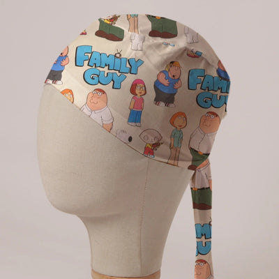Family Guy Title and Cast fabric scrub cap in Bandana tie-back style: Family Guy title and cast on cream