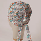 Feast Mode Induced scrub cap in Bandana tie-back style on mannequin head, back view with ties