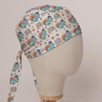 Feast Mode Induced scrub cap in Bandana tie-back style on mannequin head, front right view with the Medicus label