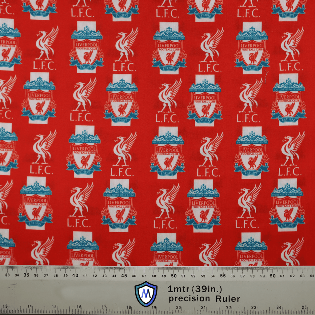 The Medicus Scrub Caps Football Club Liverpool Scrub Cap features a red fabric with repeated Liverpool FC logos, liver birds, and L.F.C. text. Its ideal for healthcare professionals who love football culture. A ruler at the bottom measures 1 meter (39 inches).