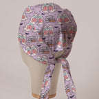 Ghouls Just Wanna Have Lungs scrub cap in Bandana tie-back style on mannequin head, back view with ties