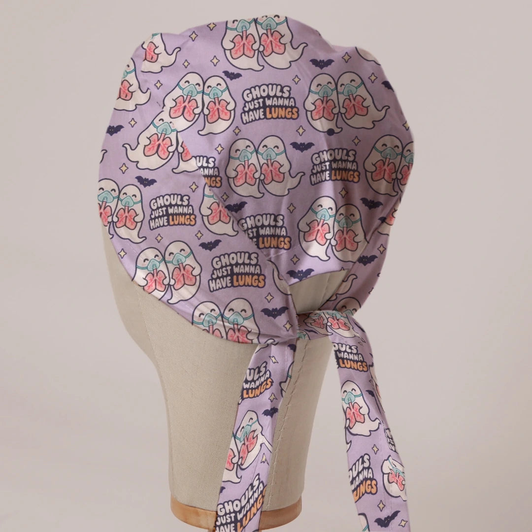 Ghouls Just Wanna Have Lungs scrub cap in Bandana tie-back style on mannequin head, back view with ties