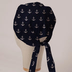 Larger Anchors On Navy scrub cap in Bandana tie-back style on mannequin head, back view with ties