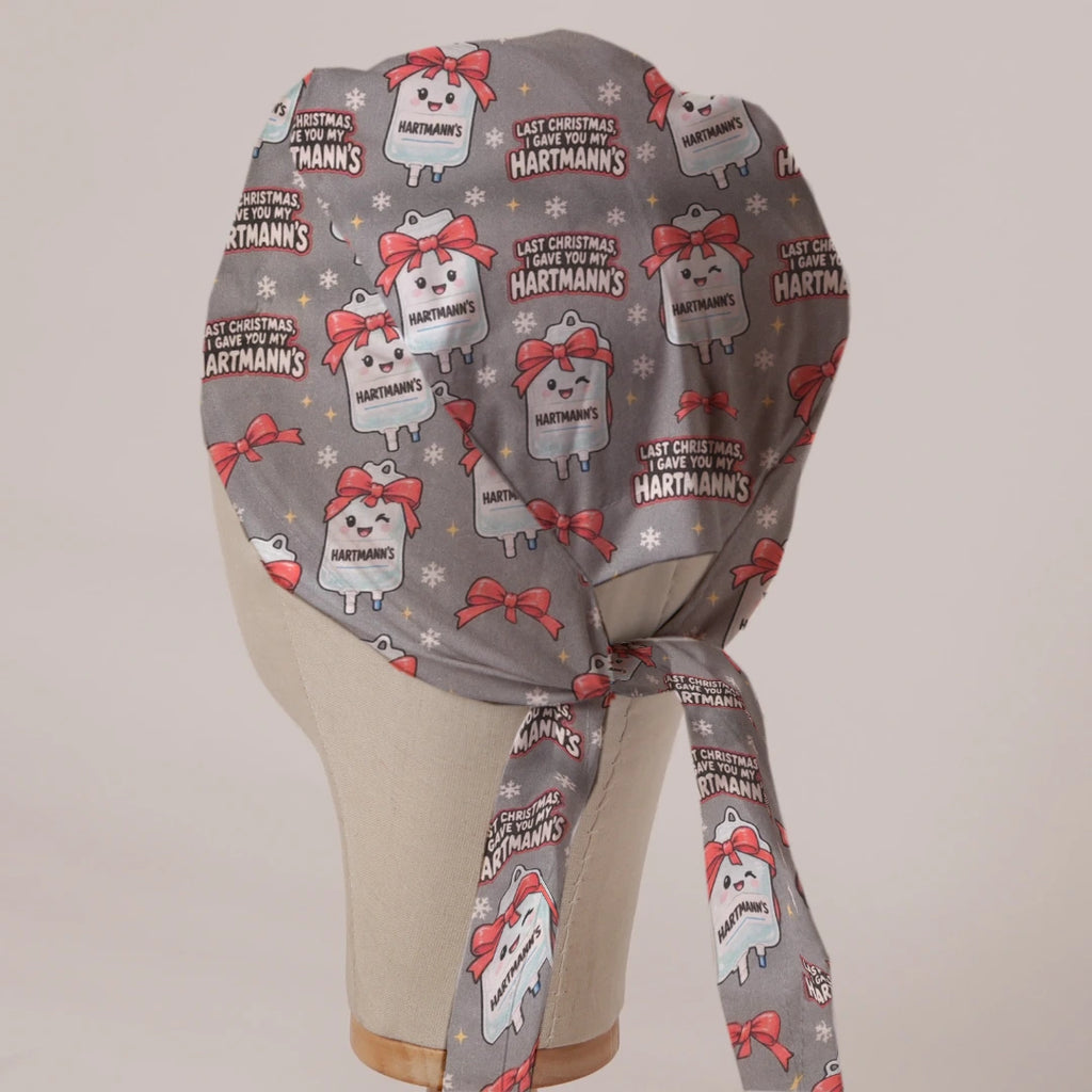 Last Christmas I Gave You My Hartmann's scrub cap in Bandana tie-back style on mannequin head, back view with ties