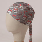 Last Christmas I Gave You My Hartmann's scrub cap: smiling Hartmann's fluid bags tied with red bows and snowflakes on grey
