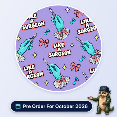 Like A Surgeon scrub cap print: gloved hands holding scalpels with lace cuffs, pink bows and music notes on lilac, with a Pre Order For October 2026 badge