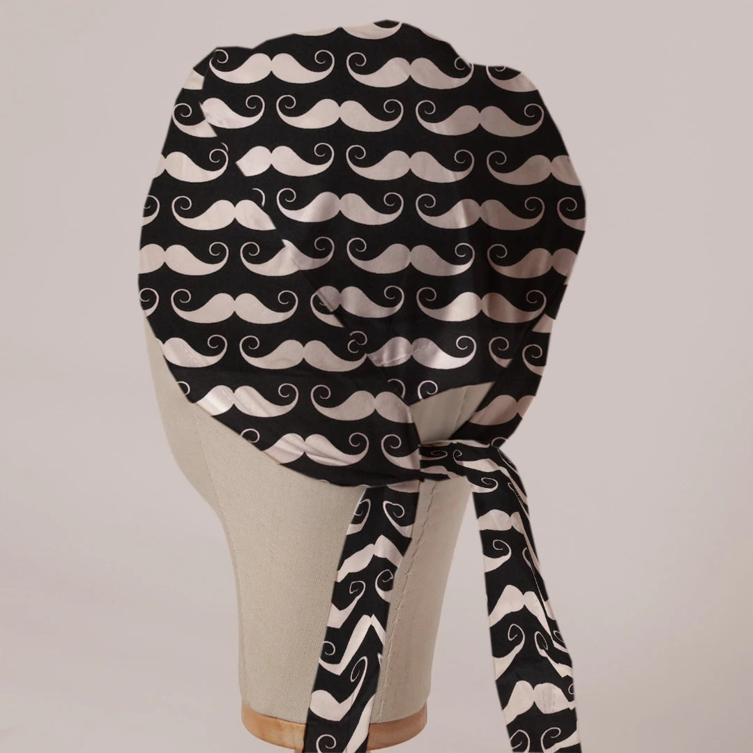 Moustaches On Black scrub cap in Bandana tie-back style on mannequin head, back view with ties